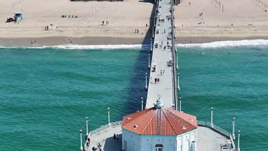 aerial video view of Roundhouse Aquarium located at dead end of Manhattan Beach Pier