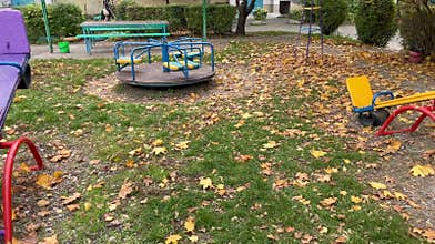 empty playground in autumn without children. Quarantine, covid-19. Orphans, sadness, loss, illness