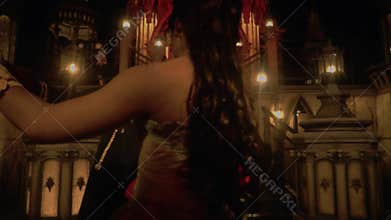A Romantic Couple in Costume Sharing a Dance in a Magical Castle.