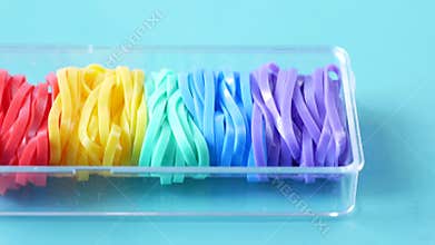 rainbow color Rubber bands on color background