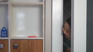 Little boy steal chocolate bar