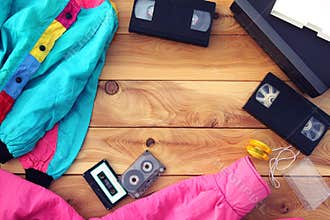 VCR, video cassettes, audio cassettes, yo-yo toy, original clothes in trendy colors from the 90s
