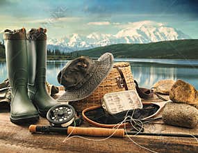 Fly fishing equipment on deck of mountains