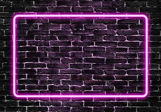 Neon purple light glowing frame on a brick wall texture.