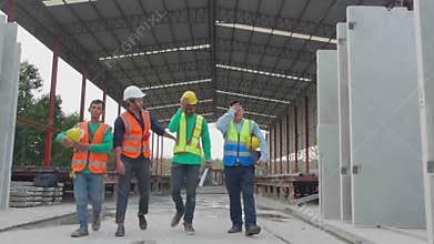 Group team engineer or contractor holding hardhat relax and talking with happy at construction site.