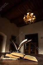 Old chateau library with old books, bookshelves