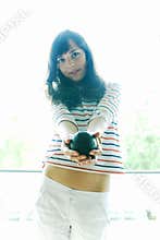Girl holding Avocado