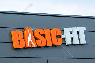 Basic-Fit logo at the gym. Basic Fit is the largest fitness chain in Europe.