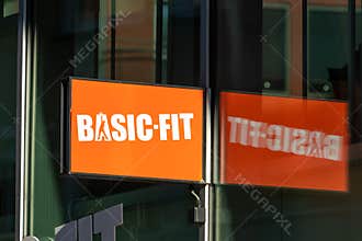 Basic-Fit logo at the gym. Basic-Fit is the largest fitness chain in Europe.