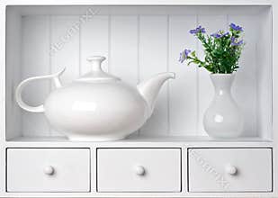 White shelf with vintage porcelain tableware
