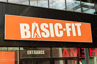 Basic-Fit logo at the gym. Basic-Fit is the largest fitness chain in Europe.
