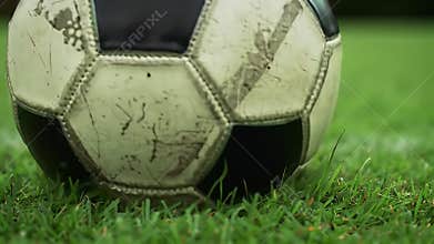 Worn Soccer Ball on Grass