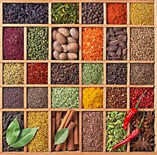 Wooden box with spices and herbs