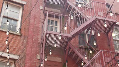 New York City Manhattan building architecture. Red brick house exterior. Real estate property, USA.