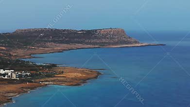 Aerial View of Ayia Napa Coastline with Resorts and Blue Waters