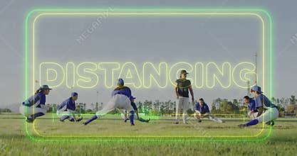 Stretching softball players wearing jerseys and baseball caps on field, with neon DISTANCING text
