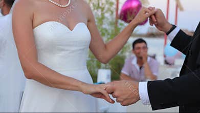 Couple wedding day and happy with ceremony, husband and wife for commitment, love trust. Hand holding, matrimony and slow dance