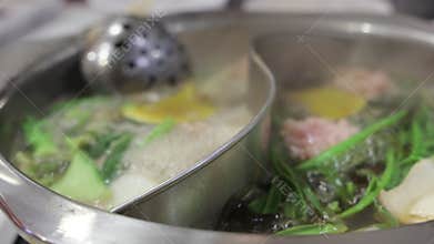 Close up of ingredients for shabu shabu or Sukiyaki set in hot pot