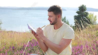 Author writing around inspiring nature