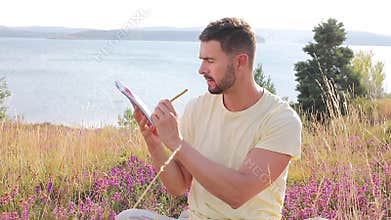 Author writing around inspiring nature