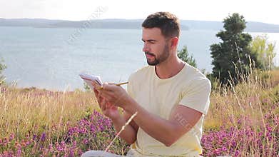 Author writing around inspiring nature