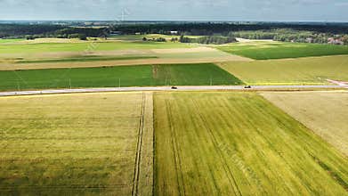 Car driving road Fields meadows nature drone flight over Greater Poland natural landscape view of the suburban road
