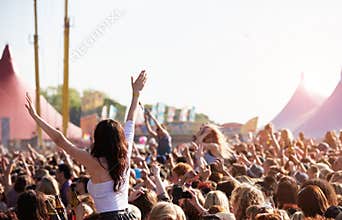 Crowds Enjoying Themselves At Outdoor Music Festival