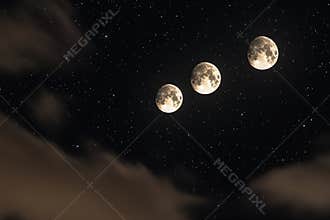 Three full moons shining brightly in a starry night sky