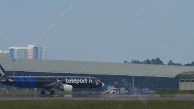 Teleport Airbus A321 taxiing at Kuala Lumpur Airport