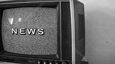 Classic Monochrome An old blackandwhite CRT monitor broadcasts a somber news ticker at the bottom. The simple bold text