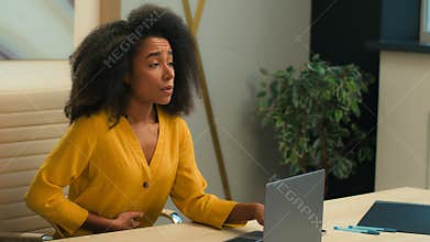 African American woman sick ill businesswoman business girl employee working laptop in office unhealthy stressed lady