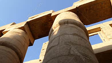 top of columns in karnak temple with ancient egypt hieroglyphics - pan view 4k