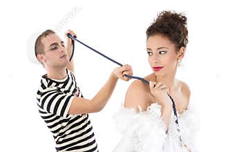 Beauty and the Beast. Young seaman posing with young woman