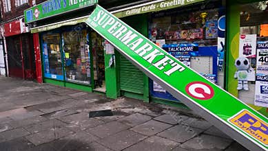 Storm damage, shop banner, London