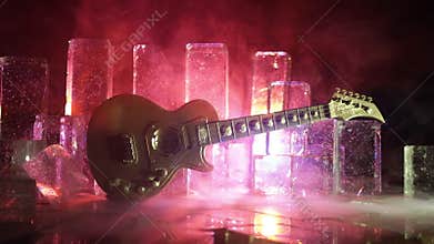 Music Concept: Guitar Miniature on a Dark Background with Vivid Light