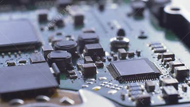 Electronic circuit board with chips and capacitors