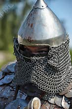 Medieval knight in armor and helmet