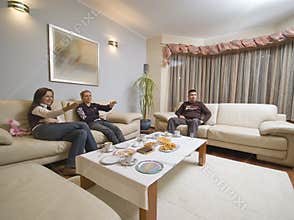 Talking in living room.