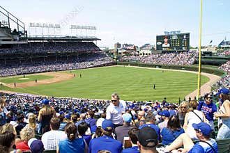 Crowded Ballpark During a Baseball Game at Wrigley Field on a Sunny Afternoon
