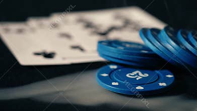Poker chips and playing cards smoking background