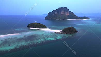 Ko Kai sandbar Islands morning mist sunrise. Majestic aerial view flight drone