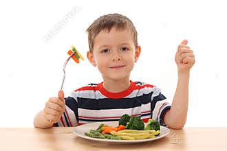 Boy and vegetables