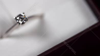 White gold ring with diamond.