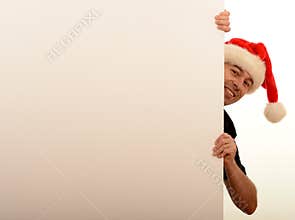 Man peeping around wall