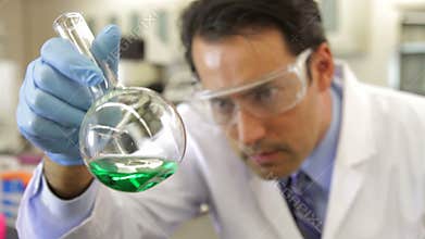 Male Scientist Working In Laboratory