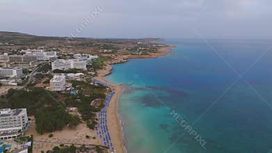 Aerial View of Ayia Napa Coastline with Resorts and Beaches
