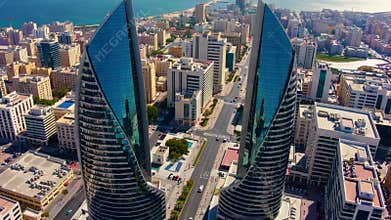Bahrain world trade center rotating in manama cityscape