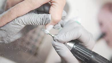 Close-up of hardware manicure of women's nails