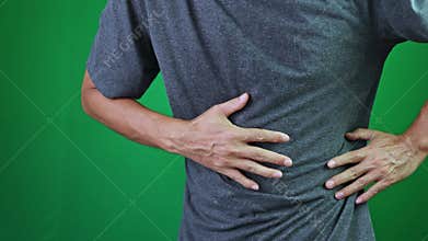 man feels abdominal pain, stomach ache, man having pains in stomach on chroma key green screen background, abdomen ache of adult,