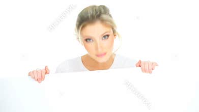 Very exited woman showing a copy space